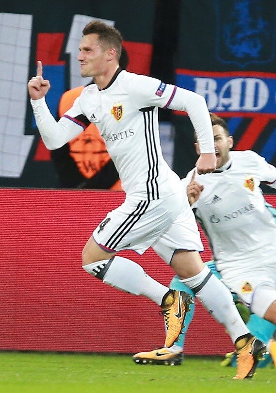 Taulant Xhaka celebrating in the FC Basel shirt during a Champions League match