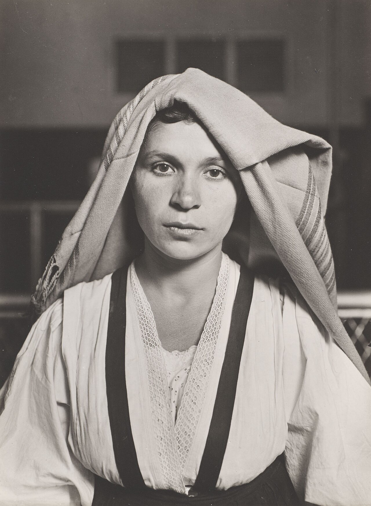 An Albanian woman from Italy photographed in traditional dress at Ellis Island in 1905
